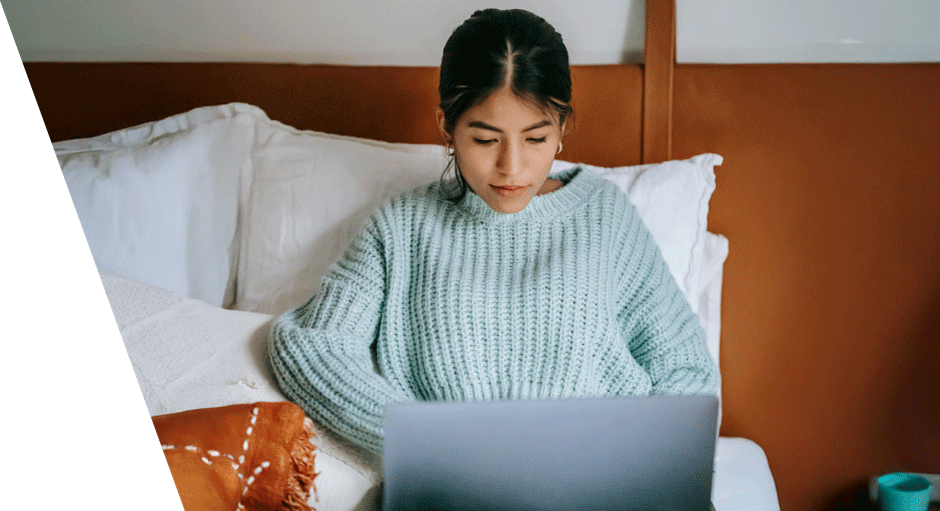 girl on laptop looking at Foresters ISA