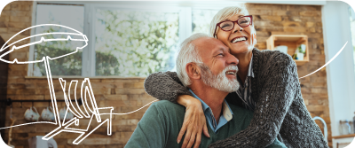 Happy older couple celebrating their pension with Foresters